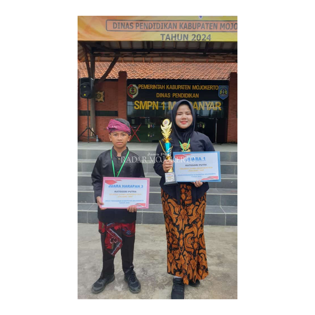 BORONG JUARA: Dua siswa SMPN 2 Mojosari berhasil memenangi juara sispres tahun 2024 sekaligus.
