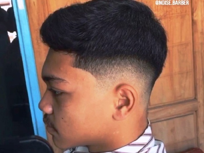 OTENTIK: Salah satu ciri gaya rambut undercut adalah bagian samping dan bawah rambut dipotong tipis. (foto: dok Muhammad Arif for Radar Mojokerto)