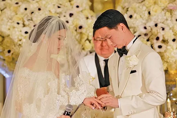 ROMANTIS: Kevin Sanjaya dan Valencia menikah di Paris, Prancis pada 23 Maret 2023. (foto dok. Jawa Pos)