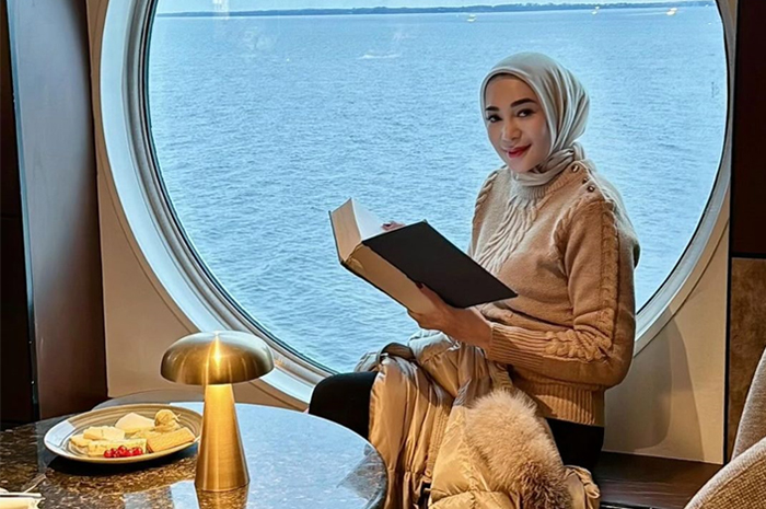 Rien Wartia Trigina atau Erin Taulany