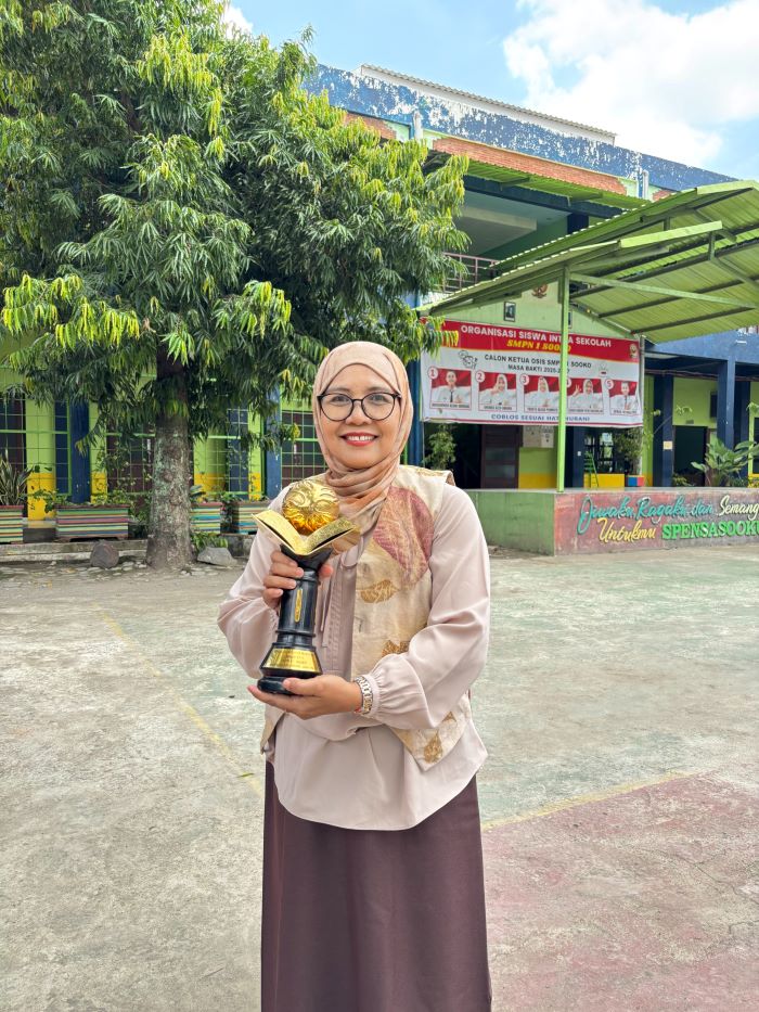 Suriani Hilal, S.Pd, SMPN 1 Sooko