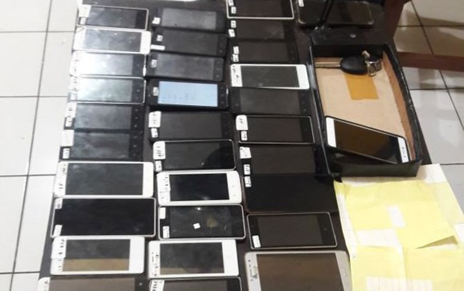 warga-surabaya-jadi-sindikat-taksi-online-fiktif
