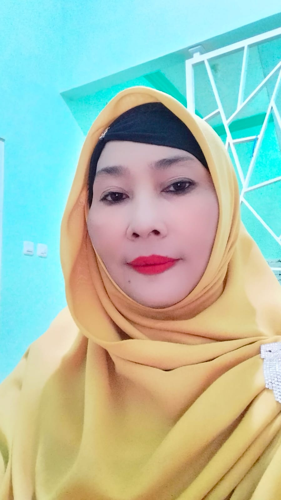 Nikmatul Mufidah , Guru SDNU 1 Trate Gresik.