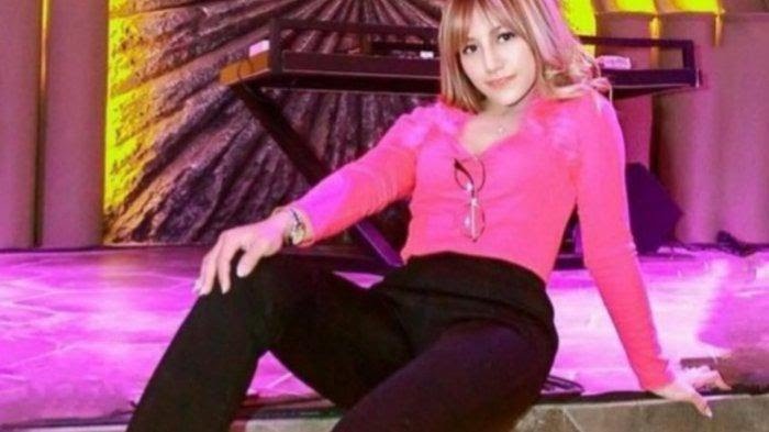 SEKSI: Tersangka Rully Febriana, 29 alias Veby Berbie yang diduga melakukan penipuan arisan bodong di Gresik.