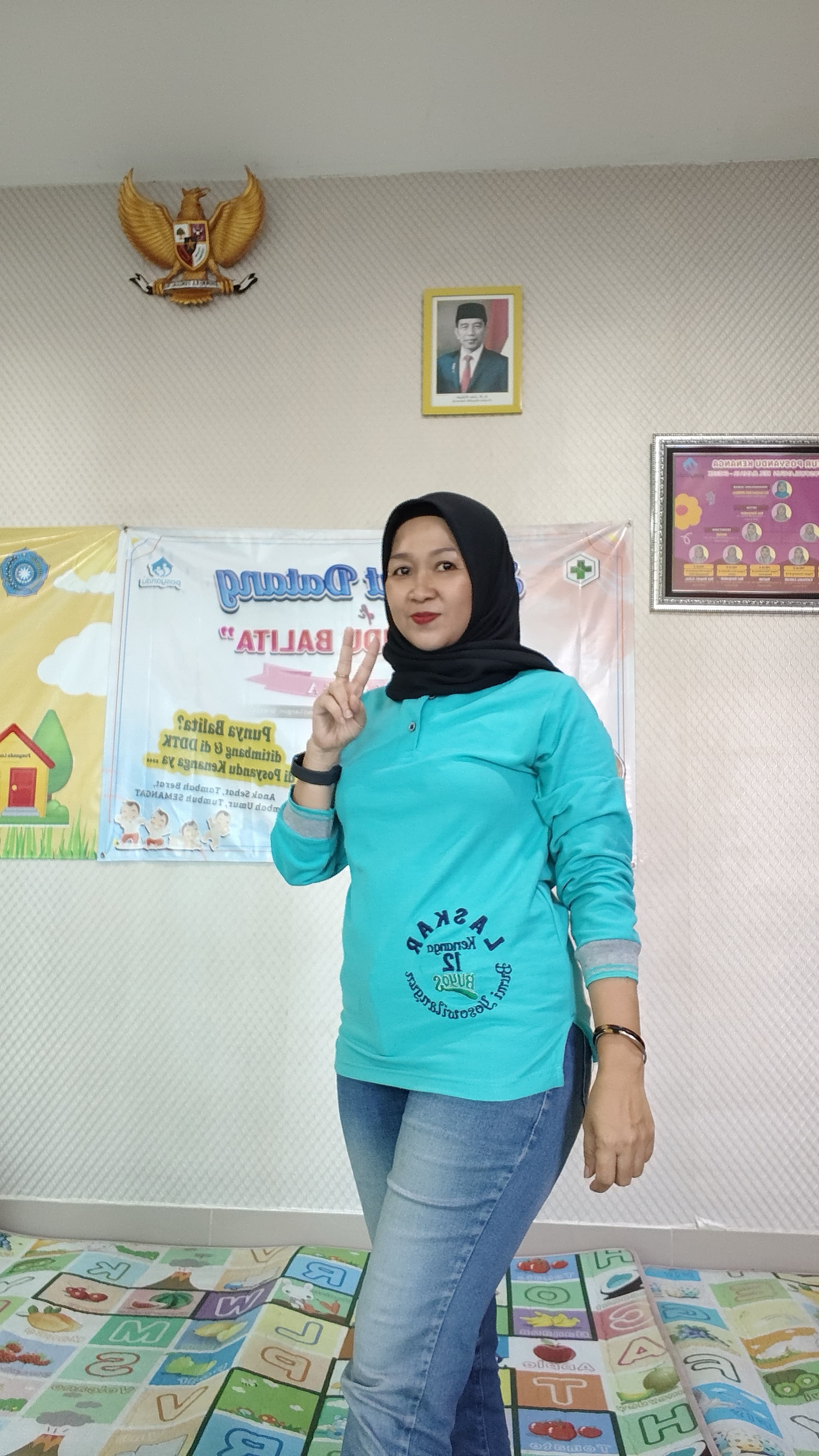 Nur Hayati, kader Posyandu Kenanga Desa Yosowilangun Gresik