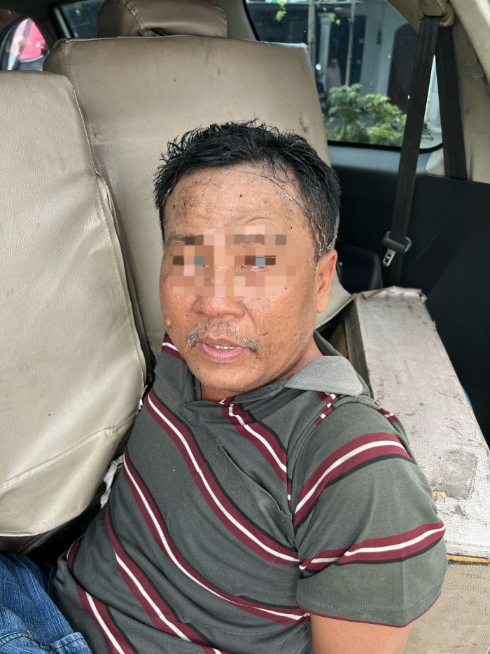 DIAMANKAN : Pelaku saat diamanakan Tim Macan Giri Polres Gresik di Dusun Buyuk, Desa Bringkang, Kecamatan Menganti, Kabupaten Gresik.