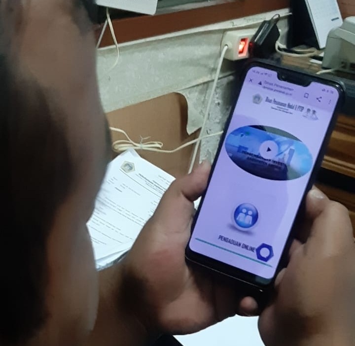 Pesan yang ditulis hacker di laman website DPM-PTSP Gresik. (Firman/Radar Gresik)