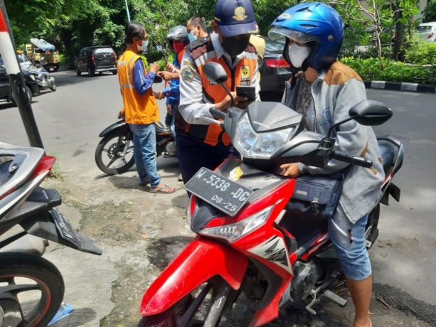 MASIH JAUH: Dishub Gresik terus berusaha memenuhi pendapatan dari sektor parkir. (Ist./Radar Gresik)