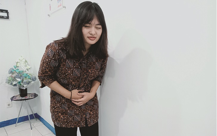 Ilustrasi penderita asam lambung.