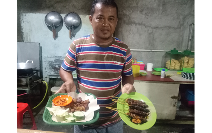 Salah satu warung khas kuliner daging anjing di Solo sekarang ganti menu babi.