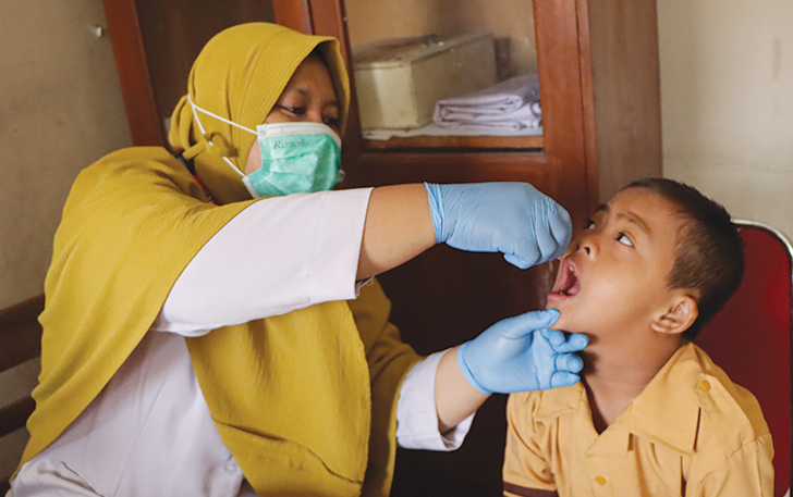 LANCAR: Siswa SLB C Setya Darma Solo menjalani sub PIN polio tahap kedua di sekolah setempat, Kamis (22/2/2024).