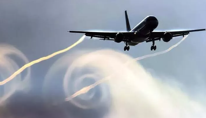 Ilustrasi pesawat alami turbulensi udara.