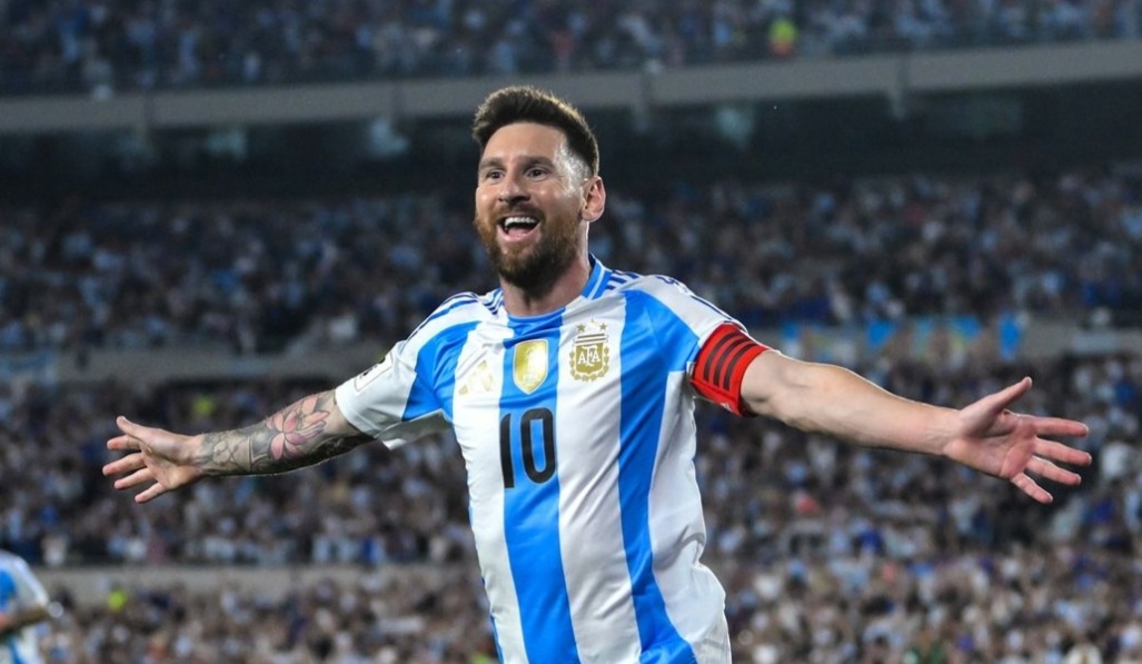 Lionel Messi merayakan golnya di Kualifikasi Piala dunia.