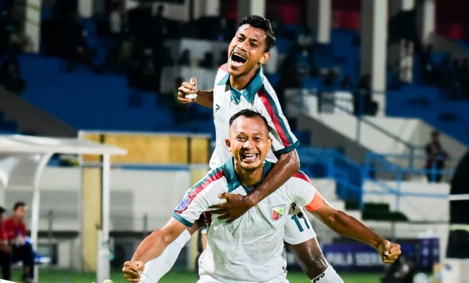 Striker Persikab Bandung Sansan Fauzi merayakan golnya ke gawang 757 Kepri Jaya FC.