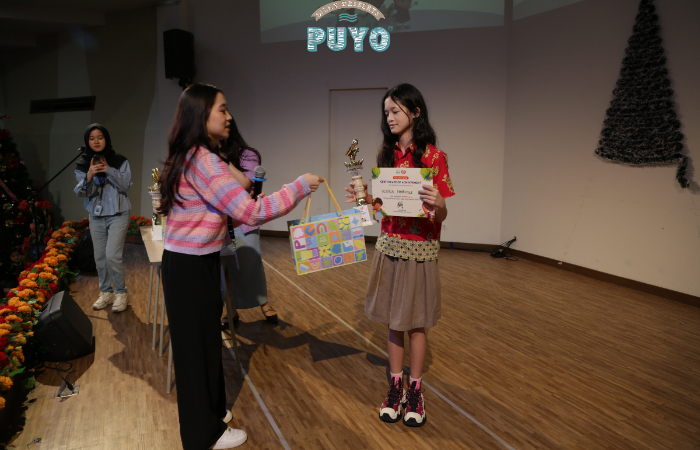 Victoria Emmanuelle, putri sulung Imanuel Juliman sukses raih juara ketiga dalam ajang Lomba Menyanyi Puyo Peduli 2024.