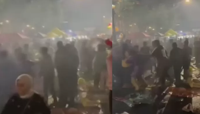 Suasana ricuh pengeroyokan seorang pria gara-gara petasan, saat perayaan malam Tahun Baru 2025 di kawasan Tugu Yogyakarta.