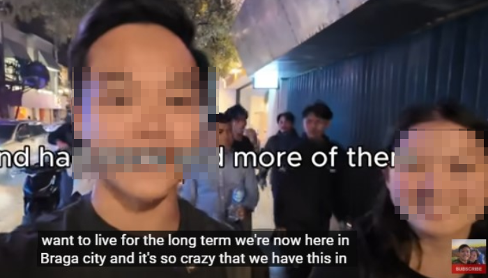 Tangkapan layar saat pasangan kekasih asa Singapura Joanna dan Darien diikuti tiga pemuda ketika ngevlog di Jalan Braga, Bandung.