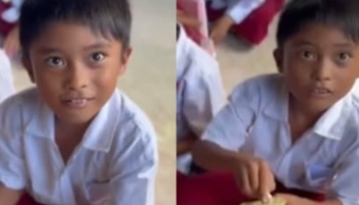 Siswa SD yang memilih membawa pulang jatah makan bergizi gratis.