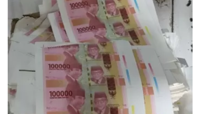Ilustrasi uang palsu alias upal.