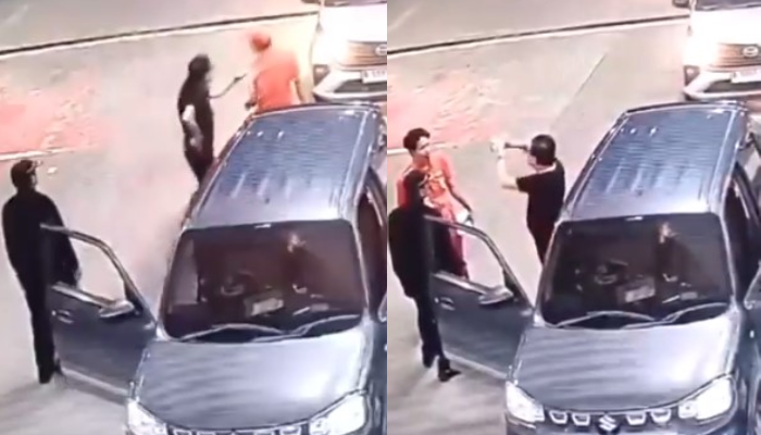 Tangkapan layar pria yang todongkan pistol ke petugas SPBU di rest area Tol Cibubur.