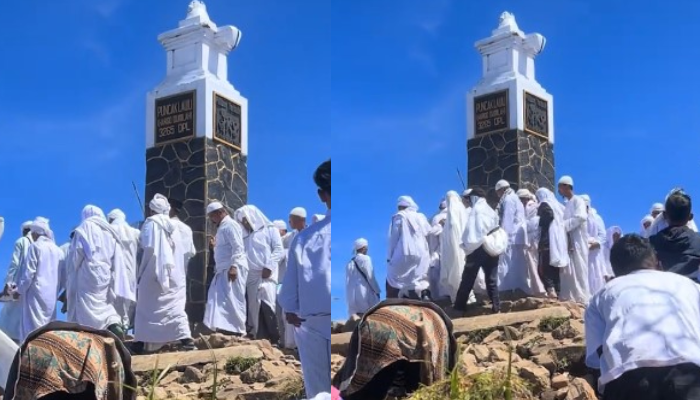 Potongan video rombongan serba putih menggelar ritual suro di puncak Gunung Lawu.