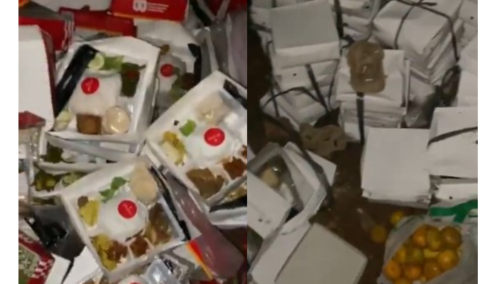 Tumpukan nasi kotak utuh dalam perayaan HUT ke-80 RI berserakan dan jadi sampah.