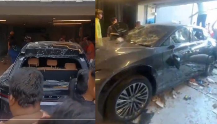 Kondisi mobil Lexus RZ di rumah Ahmad Sahroni yang hancur diamuk massa.