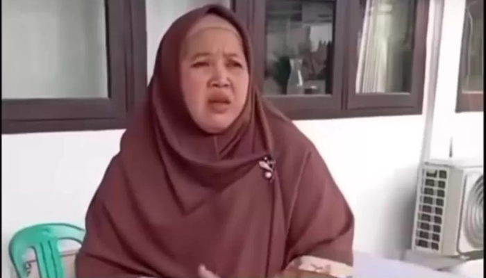 Kepala SMAN 1 Cimarga Dini Fitria.