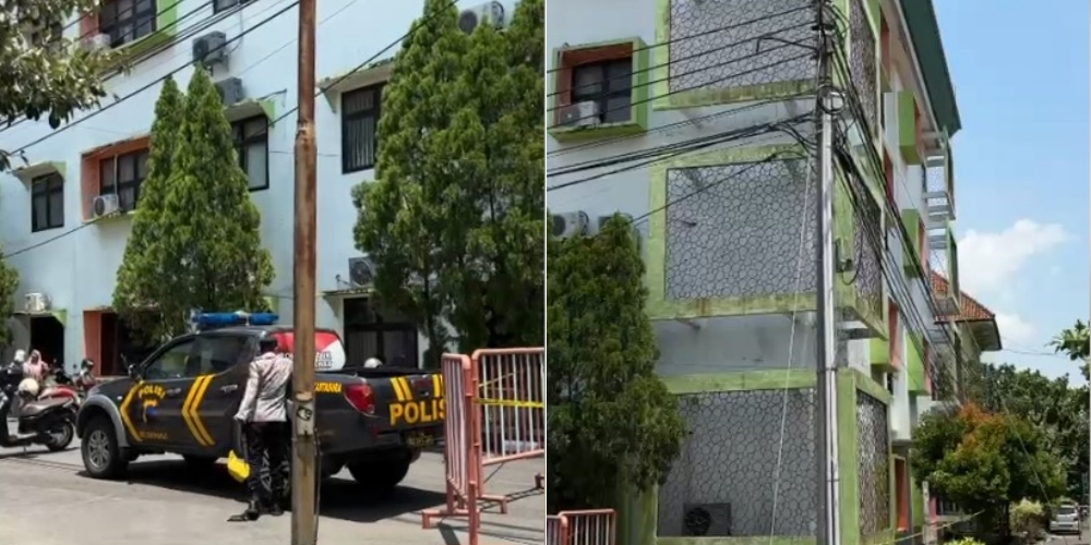 Gedung laboratorium UIN Raden Mas Said yang menjadi lokasi mahasiswi melompat telah dipasang garis polisi, Jumat (17/10/2025).