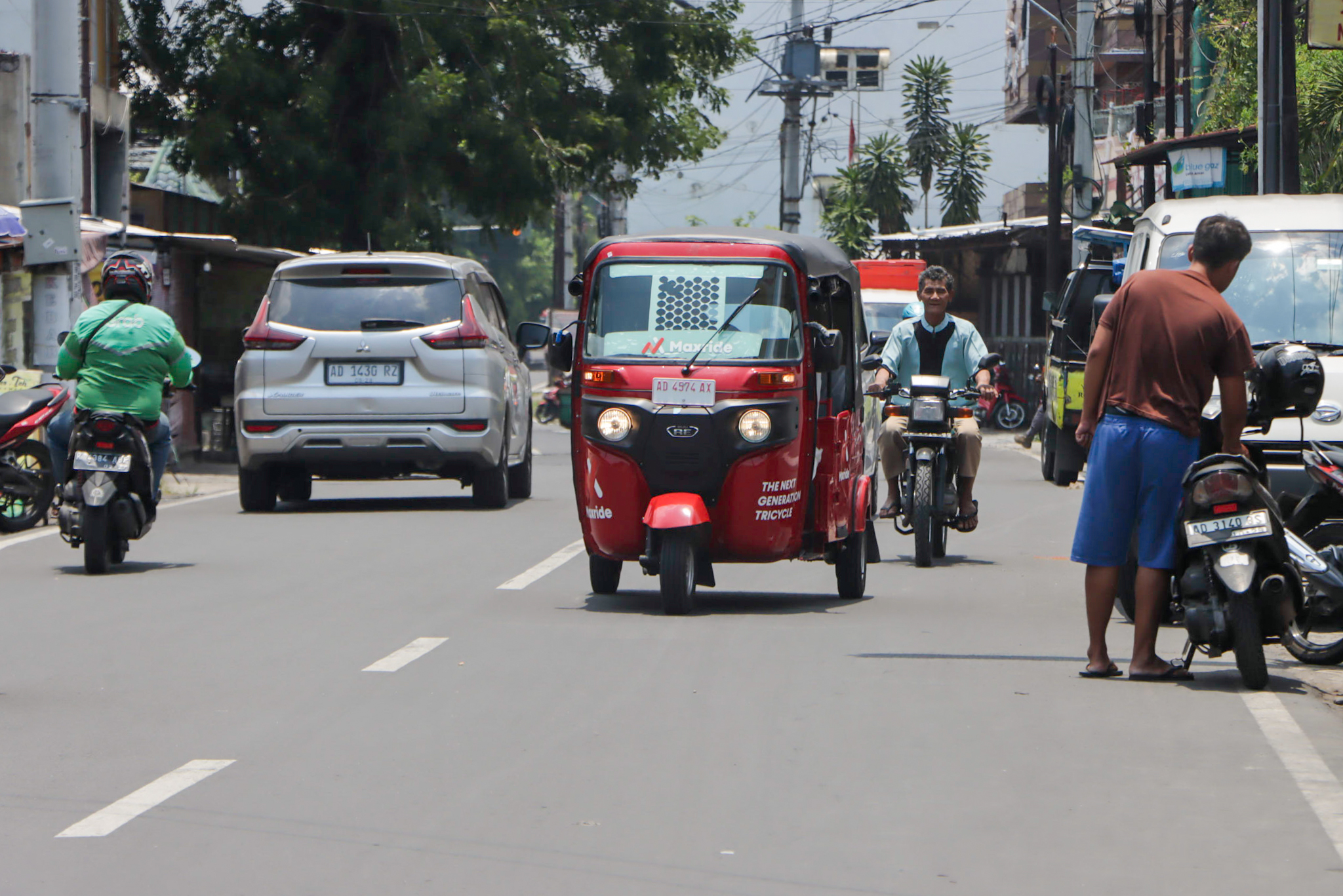 DISOROT: Kendaraan Maxride (bajaj) saat melintas di Kota Solo, belum lama ini.