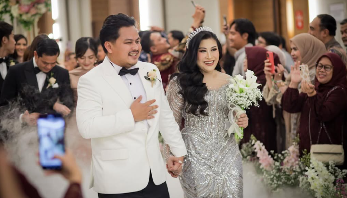 Boiyen dan sang suami Rully Anggi Akbar.