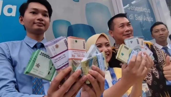 Ilustrasi layanan penukaran uang baru.