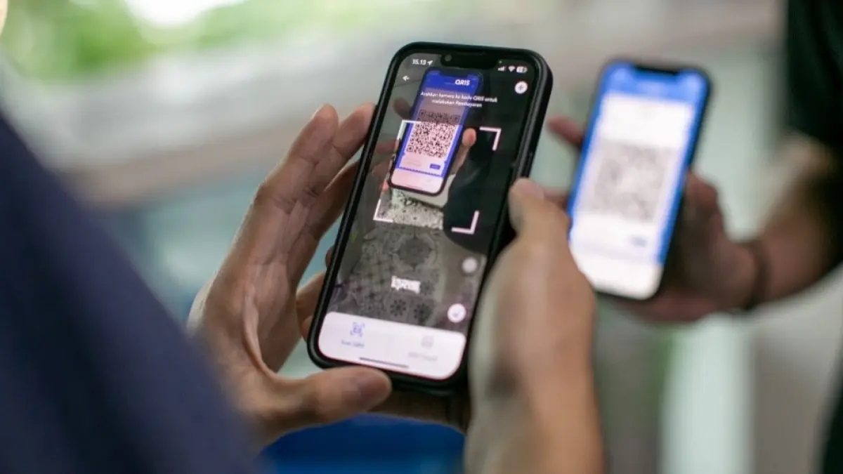 Melalui sistem ini, nasabah cukup memindai kode QR pada merchant lokal di China secara langsung. (DOK.BRI)