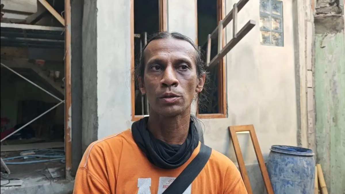 Mohamad Soehib, kakak Mohamad Aris yang menjadi korban kecelakaan kerja PLTSa Putri Cempo. (Silvester Kurniawan/Radar Solo)