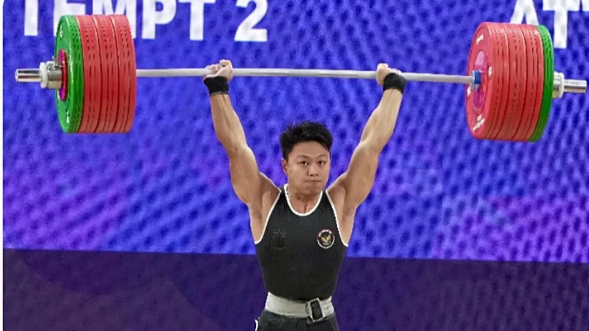 Lifter Rahmat Erwin saat berjuang di ajang Asian Games 2026 Aichi-Nagoya. (dok. Kemenpora)