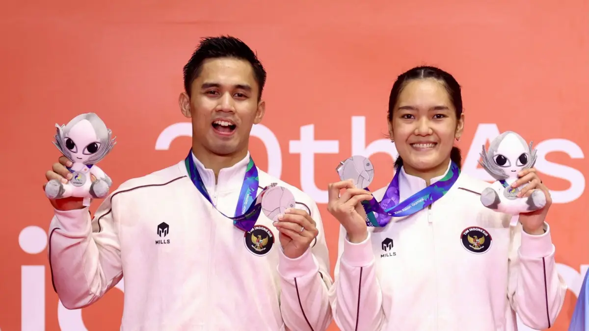 Amri Syahnawi dan Nita Violina Marwah sukses menyumbangkan medali perak di ajang Asian Games 2026. (Dok. PBSI)