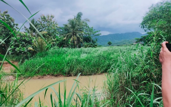 Lokasi tenggelamnya EAP di sebelah utara Pasar Wenang, Dusun Ngrembang RT 01 RW 05 Kelurahan/Kecamatan Giriwoyo, Sabtu (1/1) siang. (ISTIMEWA)