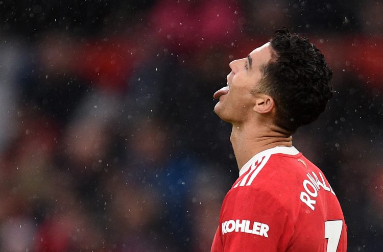 Gestur Cristiano Ronaldo setelah gagal memanfaatkan peluang dalam laga Manchester United kontra Southampton FC di Old Trafford. (OLI SCARF/AFP )
