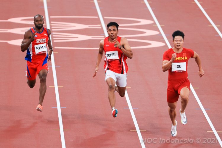 Lalu Muhammad Zohri (tengah) saat berlaga pada Olimpiade Tokyo 2020. (NOC Indonesia Photo)