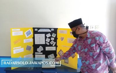 INOVATIF: Alat pendeteksi hujan karya murid SMP Lazuardi Kamila Global Compassionate School. Foto kanan, Dhiyaul Haq’athullah.(RAGIL LISTIYO/RADAR SOLO)