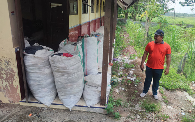 FUNGSIONAL: Eks bangunan SDN Kedawung III untuk menampung sampah rumah tangga. (KADES KEDAWUNG RIKI ASTONO FOR RASO)