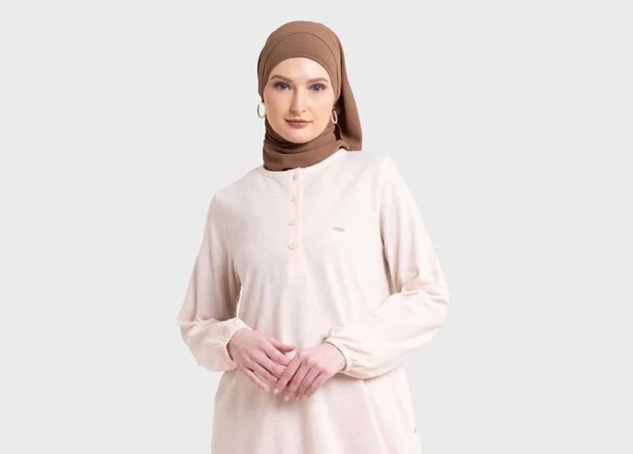 Tunik modis dan nyaman jadi pilihan outfit. (IST)