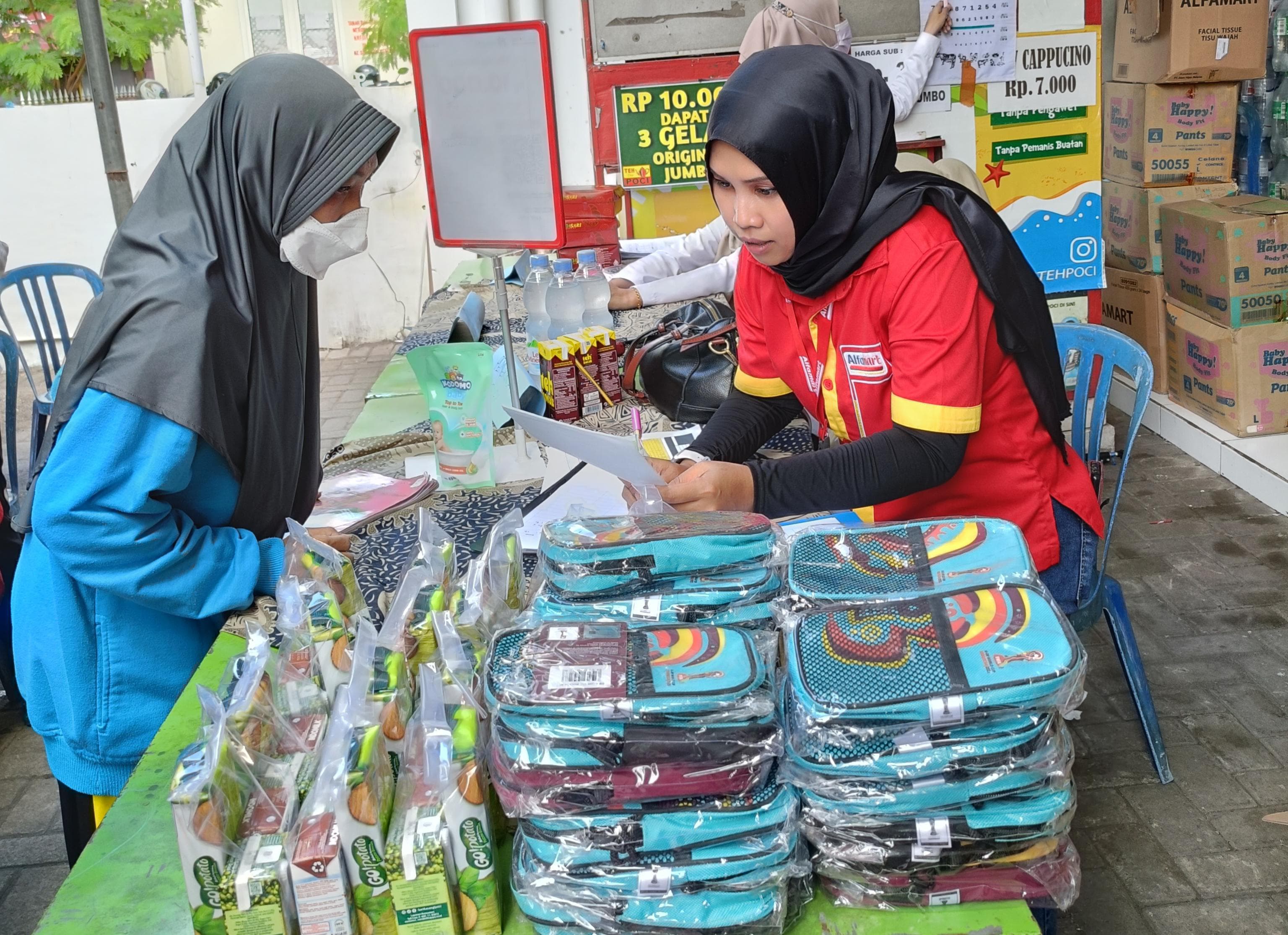 PEDULI: Alfamart bersama Baby Happy (Wings Group) memperkuat kolaborasi dalam program Alfamart Sahabat Posyandu yang digelar di 34 kota di Indonesia.