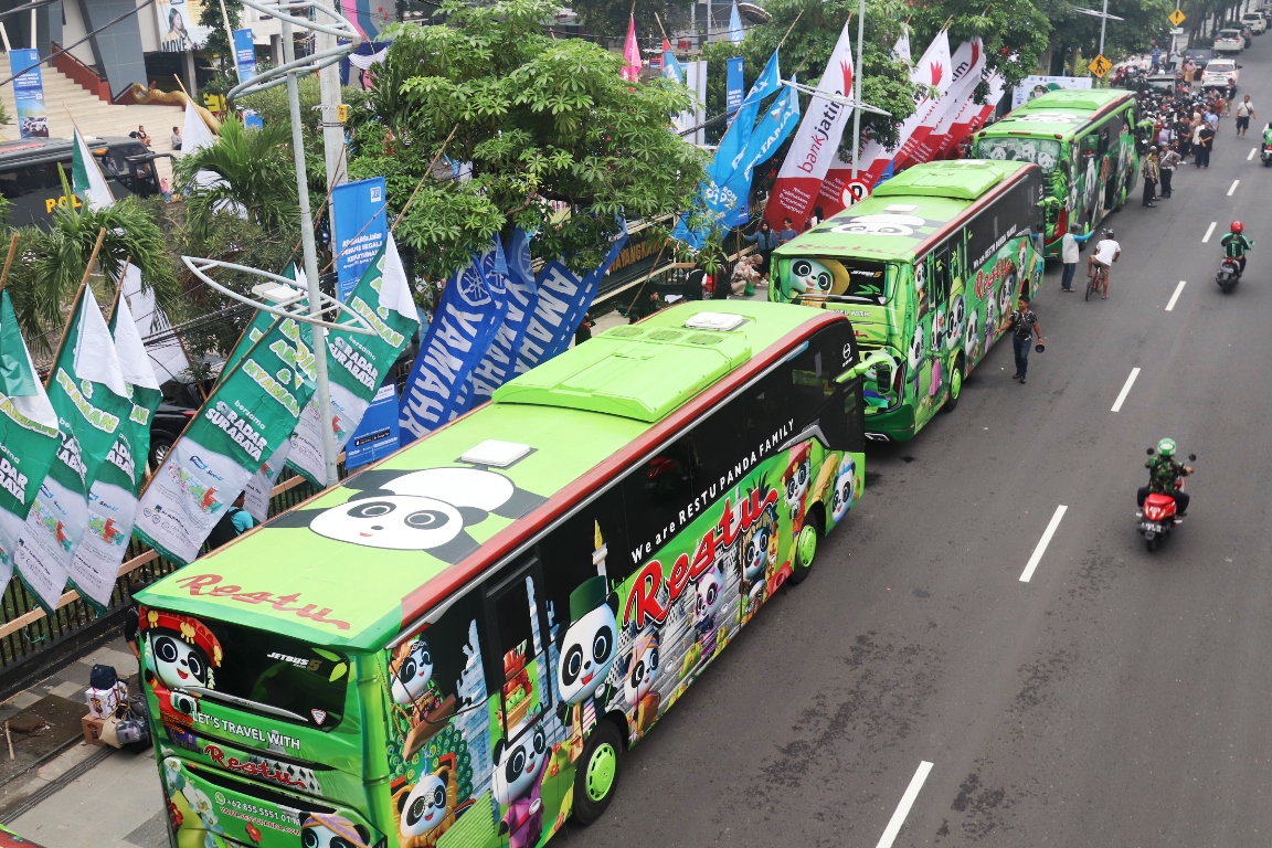 NYAMAN: Program Mudik Gratis Radar Surabaya 2025 berlangsung aman dan lancar.  (SURYANTO/RADAR SURABAYA)