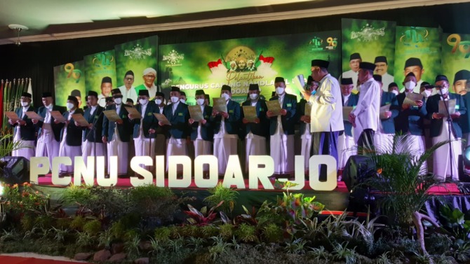 SAH: Pengurus Cabang Nahdlatul Ulama (PCNU) Kabupaten Sidoarjo periode 2021-2026 resmi dilantik di Gedung KBIH Rohmatul Ummah Jl. Monginsidi, Sidokumpul, Sidoarjo, Kamis (17/2).