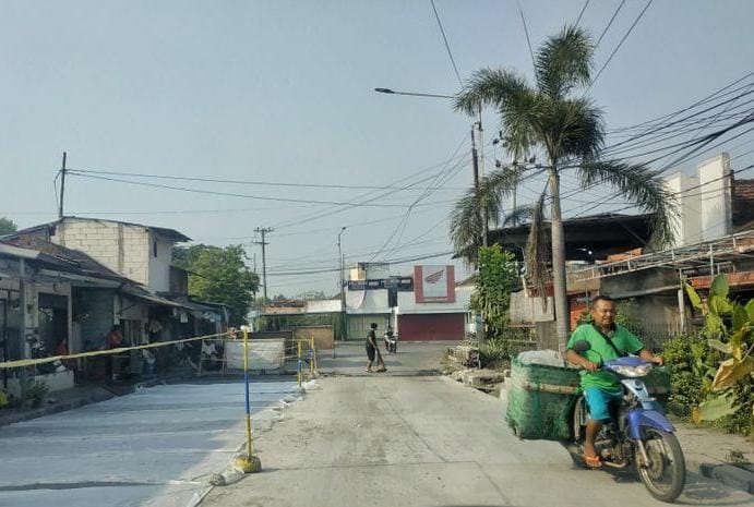 TUNTAS: Betonisasi di Tlasih, Kecamatan Tulangan yang sudah selesai dikerjakan. (ANNISA FIRDAUSI/RADAR SIDOARJO)