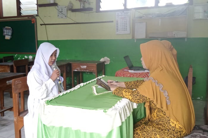 Peserta ujian tahfiz yang digelar Kemenag Jombang di Kecamatan Ngoro, (28/12) lalu.