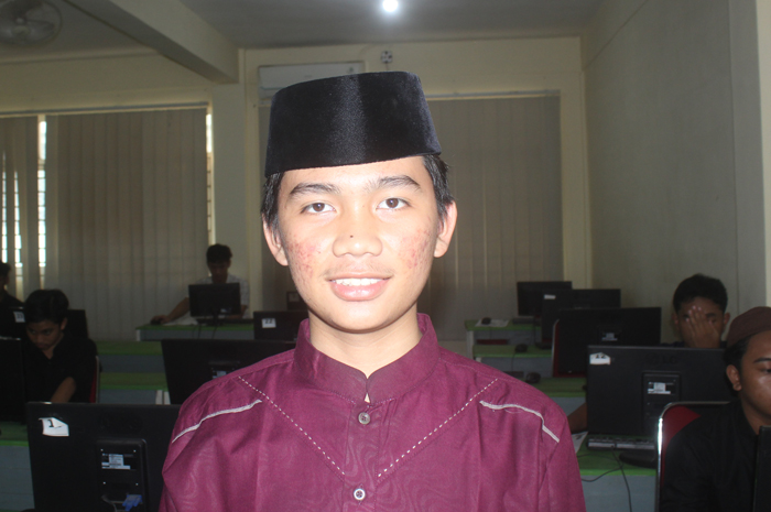 Muhsin Labib Ahmad Abidin, kelas X-H MA Aliyah Madrasatul Qur