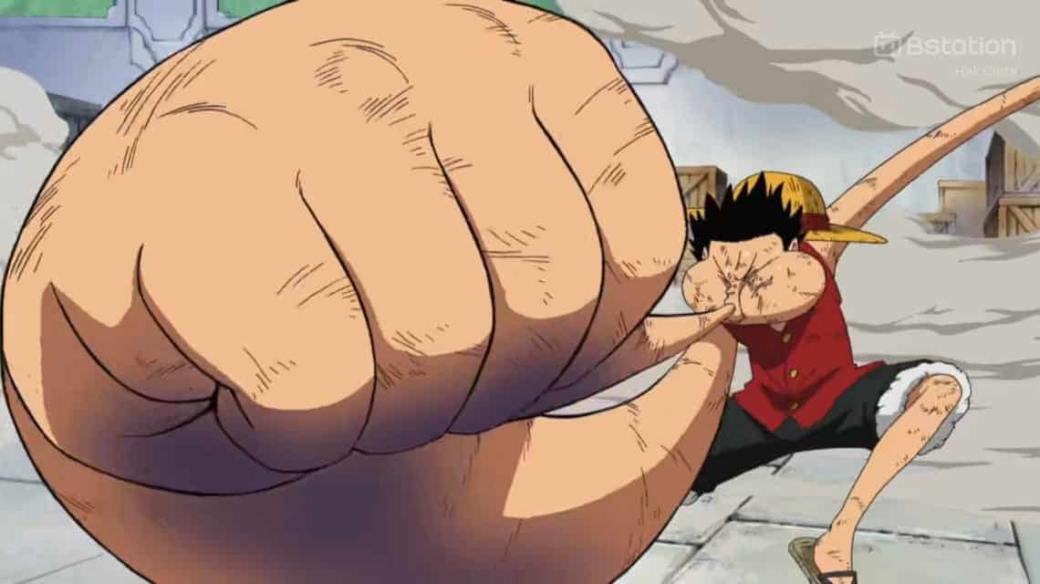Luffy meniup jarinya dan membuat tangannya menggembung dan mengaktifkan mode gear 3