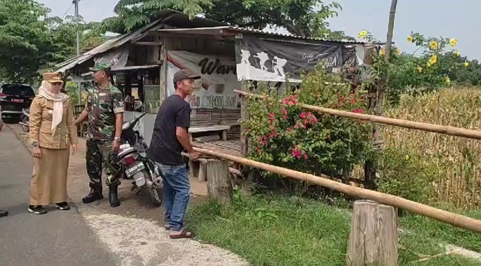 DIBUKA: jalan masuk menuju area Situs Petirtaan Sumberbeji di Desa Kesamben, Kecamatan Ngoro dibuka kemarin (11/11).